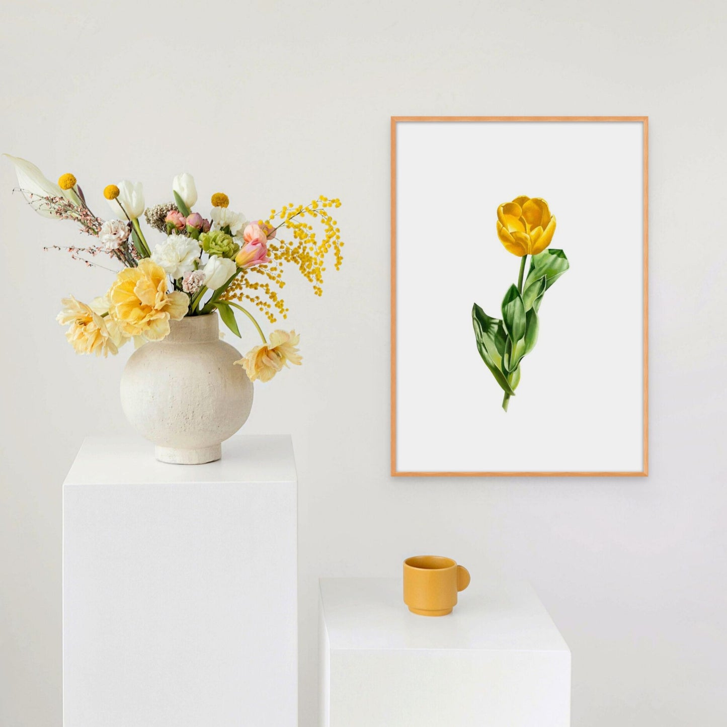 Framed print of a yellow tulip with large green leaves containing strong shadows.